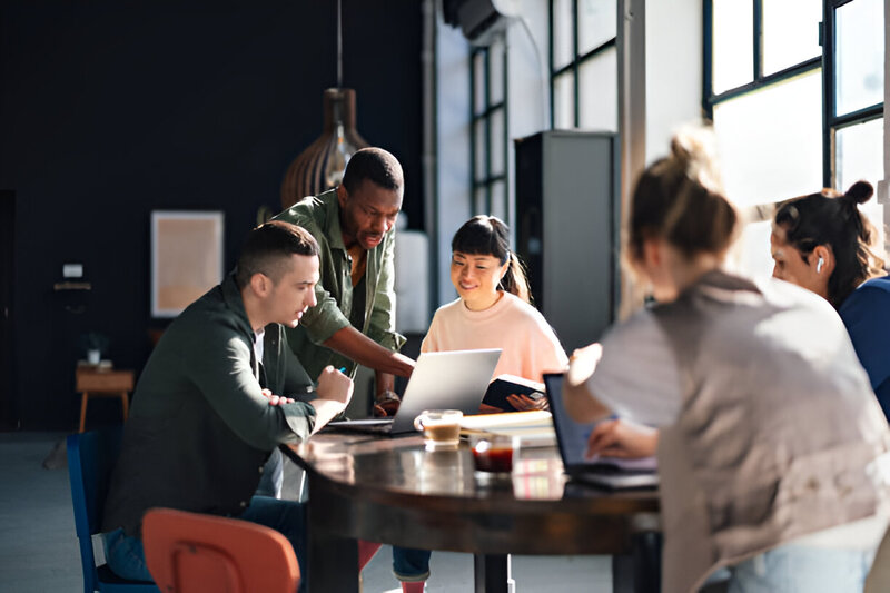 A culture fit team working on a project together